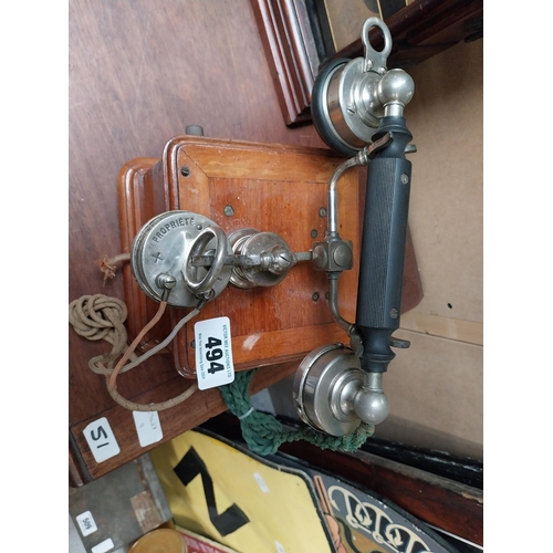 494 - Early 1900's mahogany and chrome telephone. {24 cm H x 19 cm W x 19 cm D}