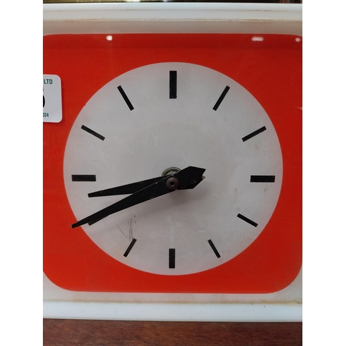 495 - 1970's Draught Guinness Perspex battery advertising clock. {18 cm H x 36 cm W x 7 cm D}.