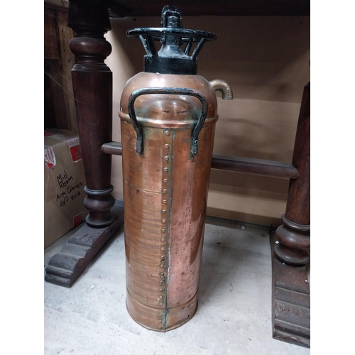 499 - 19th C. Guardienne copper and brass fire extinguisher. {61 cm H x 19 cm W}.