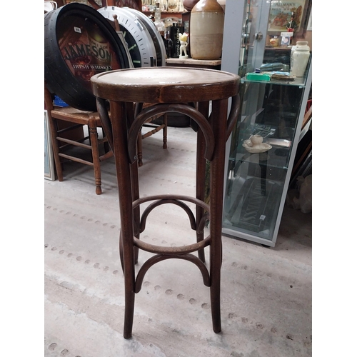 503 - Two bentwood bar stools. {80 cm H x 37 cm Dia.}.