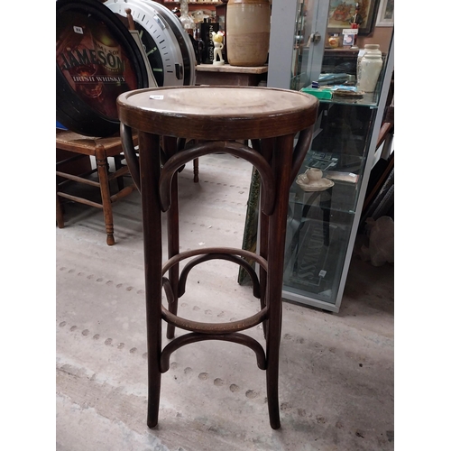 503 - Two bentwood bar stools. {80 cm H x 37 cm Dia.}.