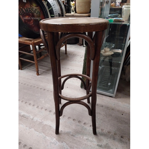 503 - Two bentwood bar stools. {80 cm H x 37 cm Dia.}.