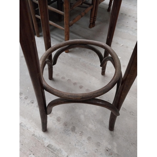 506 - Two bentwood bar stools. {80 cm H x 37 cm Dia.}.