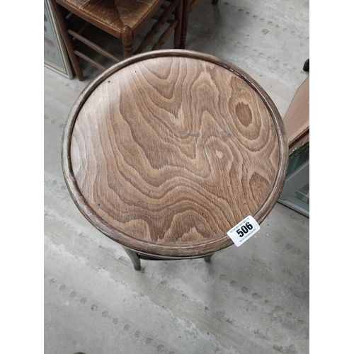 506 - Two bentwood bar stools. {80 cm H x 37 cm Dia.}.