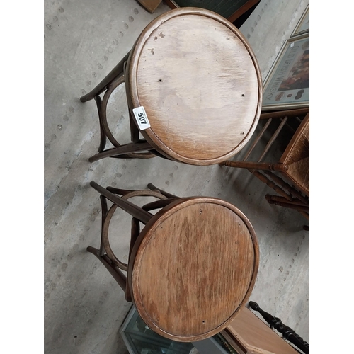 507 - Two bentwood bar stools. {80 cm H x 37 cm Dia.}.