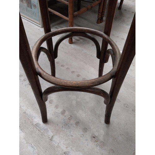 507 - Two bentwood bar stools. {80 cm H x 37 cm Dia.}.