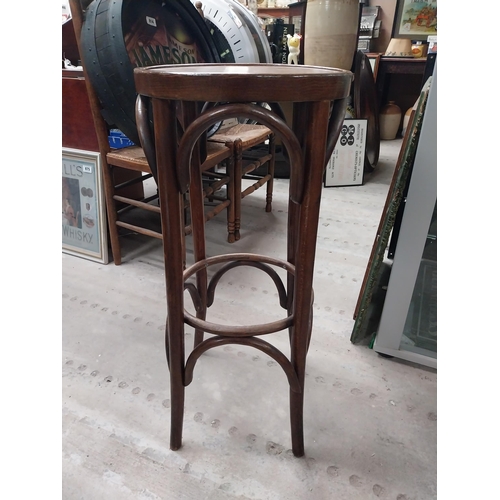 508 - Three bentwood bar stools. {80 cm H x 37 cm Dia.}.