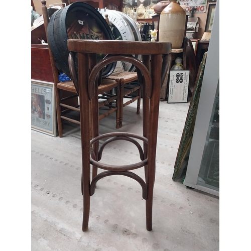 508 - Three bentwood bar stools. {80 cm H x 37 cm Dia.}.