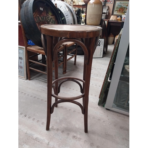 508 - Three bentwood bar stools. {80 cm H x 37 cm Dia.}.