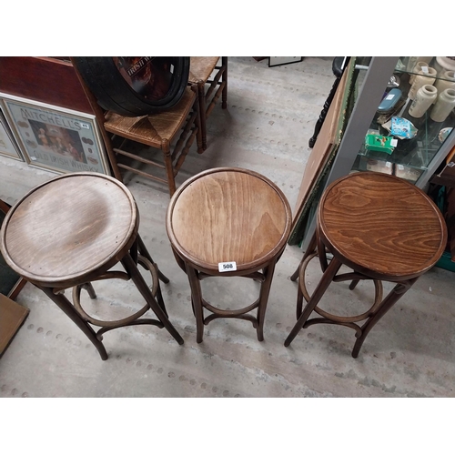 508 - Three bentwood bar stools. {80 cm H x 37 cm Dia.}.