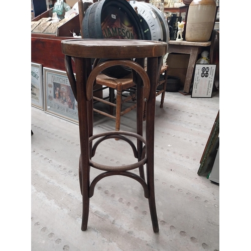 508 - Three bentwood bar stools. {80 cm H x 37 cm Dia.}.