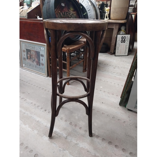 508 - Three bentwood bar stools. {80 cm H x 37 cm Dia.}.