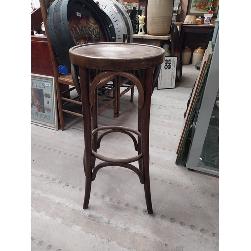 508 - Three bentwood bar stools. {80 cm H x 37 cm Dia.}.