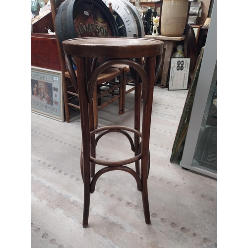 508 - Three bentwood bar stools. {80 cm H x 37 cm Dia.}.