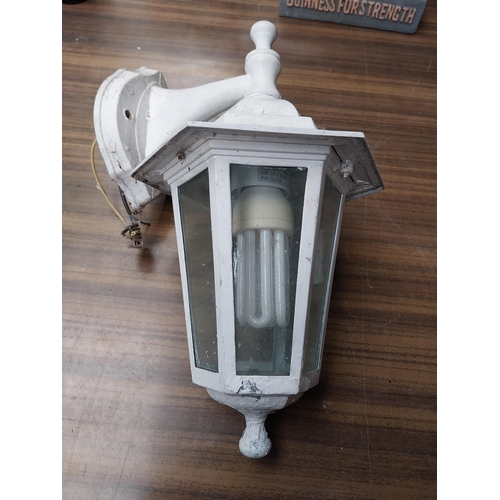 512 - Pair of metal and glass wall lanterns. {33 cm H x 21 cm W x 20 cm D}.