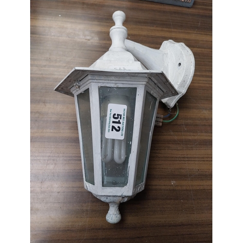 512 - Pair of metal and glass wall lanterns. {33 cm H x 21 cm W x 20 cm D}.