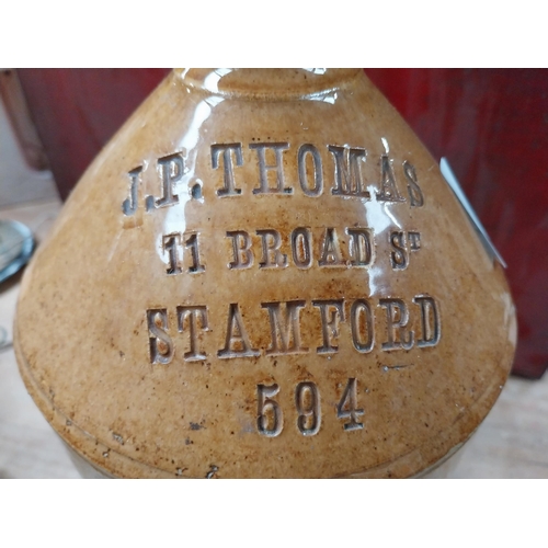 514 - J P Thomas 11 Broad Street Stamford stoneware flagon. {24 cm H x 17 cm Dia.} and Balls Anti Curd sto... 