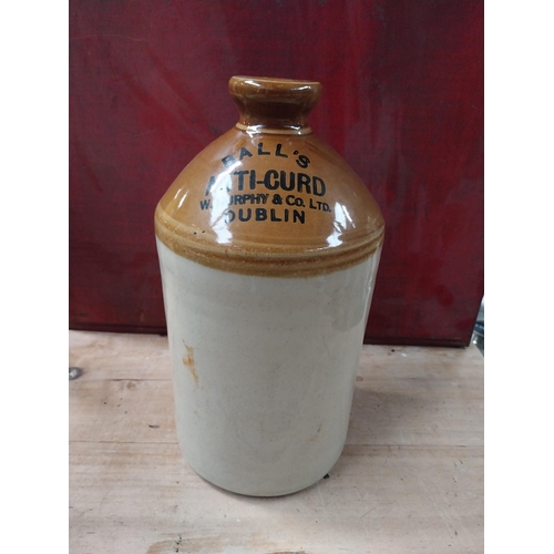 514 - J P Thomas 11 Broad Street Stamford stoneware flagon. {24 cm H x 17 cm Dia.} and Balls Anti Curd sto... 