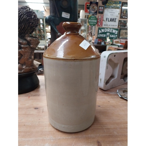 520 - Robinson and Riddley Wellingborough stoneware flagon {34 cm H x 15 cm Dia.} and SRD stoneware flagon... 