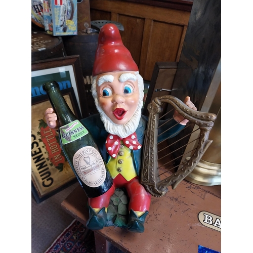 524 - Rare Ruberoid Guinness Leprechaun advertising figure {42 cm H x 32 cm W x 26 cm D}.