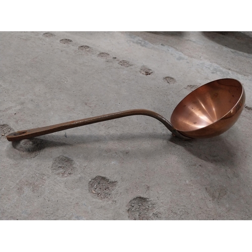 528 - Collection of 19th C. copperware including colanders and jelly moulds.