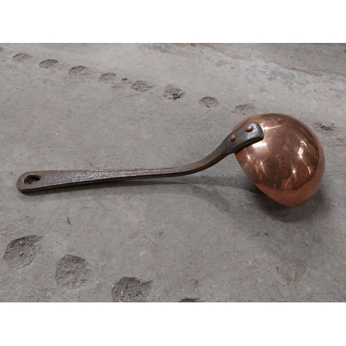 528 - Collection of 19th C. copperware including colanders and jelly moulds.