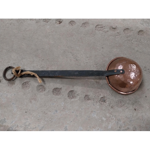 528 - Collection of 19th C. copperware including colanders and jelly moulds.