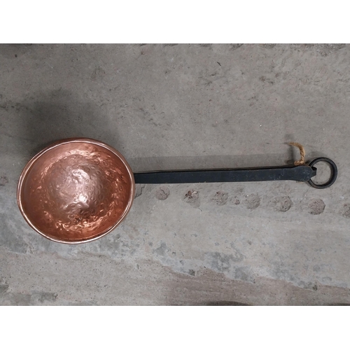 528 - Collection of 19th C. copperware including colanders and jelly moulds.