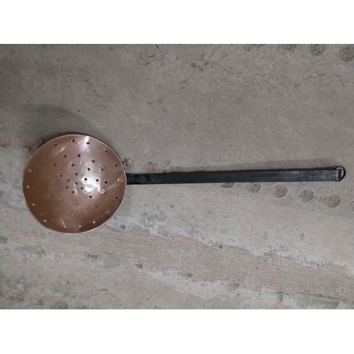 528 - Collection of 19th C. copperware including colanders and jelly moulds.