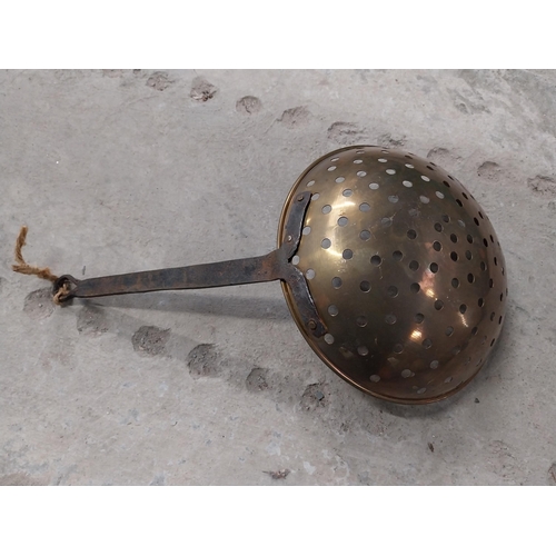 528 - Collection of 19th C. copperware including colanders and jelly moulds.