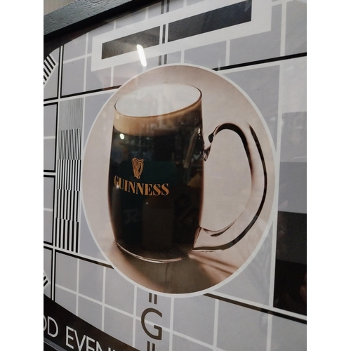 537 - Guinness A Good Evenings Entertainment framed advertising print. {33 cm H x 64 cm W}.