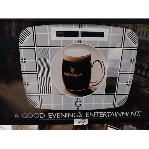 537 - Guinness A Good Evenings Entertainment framed advertising print. {33 cm H x 64 cm W}.