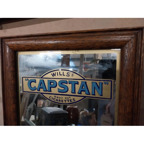 542 - Wills's Capstan Cigarettes framed advertising mirror. {42 cm H x 31 cm W}.