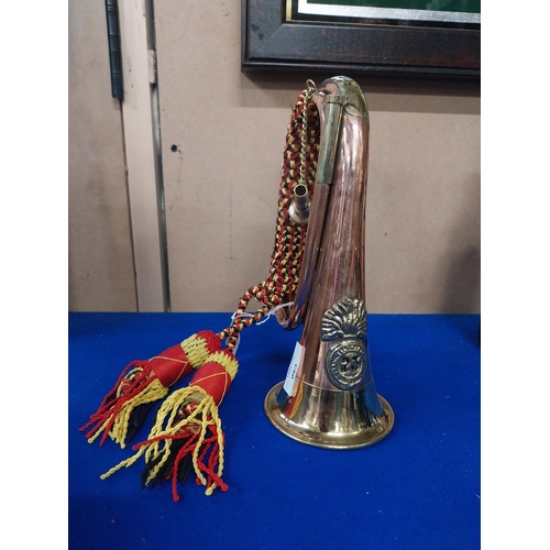 556 - Copper and Brass Army bugle. {25 cm L}.