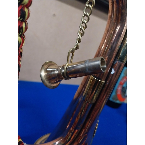 556 - Copper and Brass Army bugle. {25 cm L}.