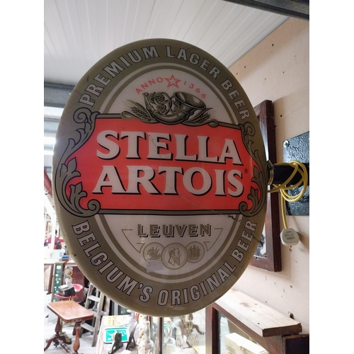 57 - Stella Artois Lager double sided light up advertising sign. {74 cm H x 56 cm W}.