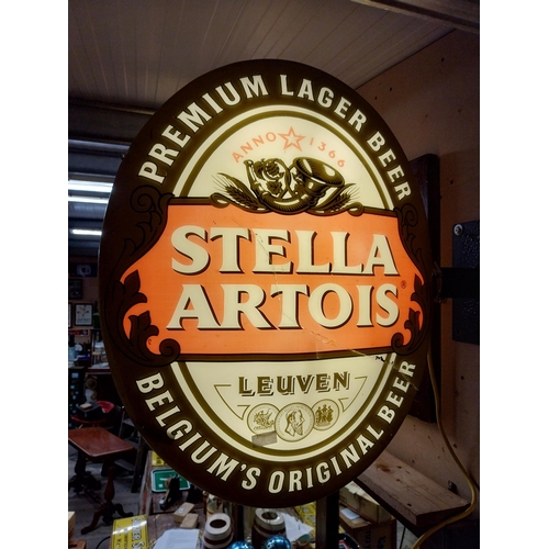 57 - Stella Artois Lager double sided light up advertising sign. {74 cm H x 56 cm W}.