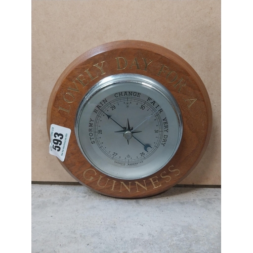 593 - Lovely Day for A Guinness oak advertising barometer. {20 cm Dia.}.