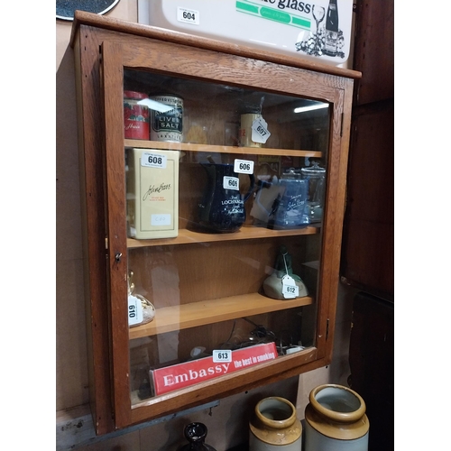 606 - 1970's oak wall display cabinet with single glazed door. {73 cm H x 61 cm W x 13 cm D}