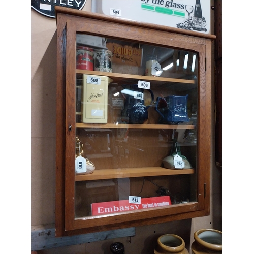 606 - 1970's oak wall display cabinet with single glazed door. {73 cm H x 61 cm W x 13 cm D}