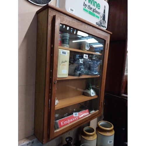 606 - 1970's oak wall display cabinet with single glazed door. {73 cm H x 61 cm W x 13 cm D}