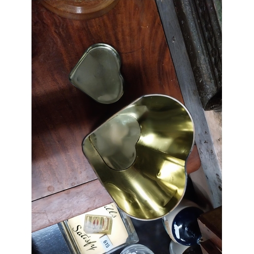 621 - Two 1970's heart shaped metal advertising Biscuit tins. {23 cm H x 12 cm Dia.}