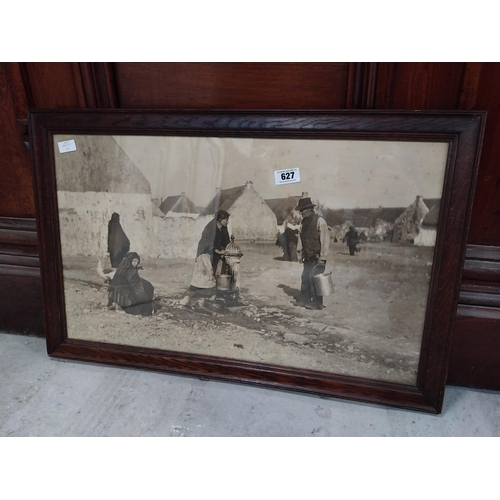 627 - Framed black and white print of West of Ireland in the early 1900's. {55 cm H x 85 cm W}.