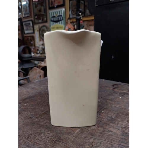 635 - Powers Gold Label Irish Whiskey Wade ceramic advertising jug. {16 cm H x 16 cm W x 9 cm D}.