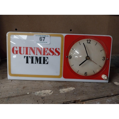 67 - Guinness Time Perspex advertising clock. {14 cm H x 38 cm W}.