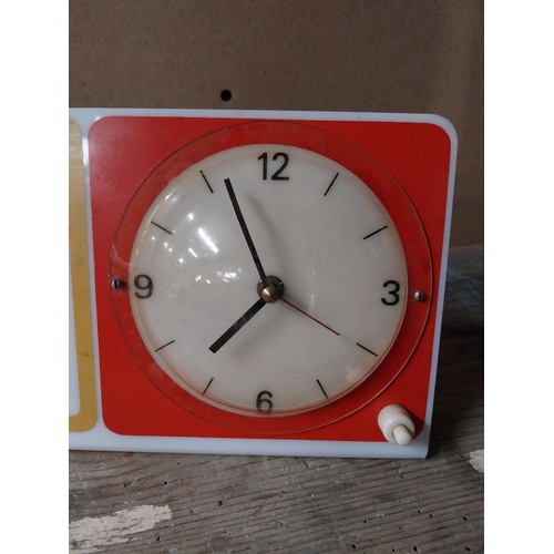 67 - Guinness Time Perspex advertising clock. {14 cm H x 38 cm W}.