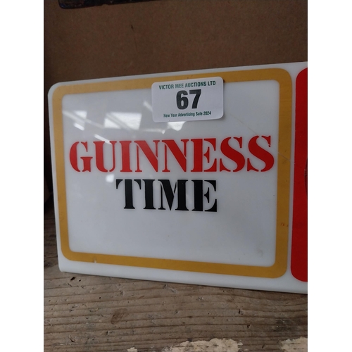 67 - Guinness Time Perspex advertising clock. {14 cm H x 38 cm W}.