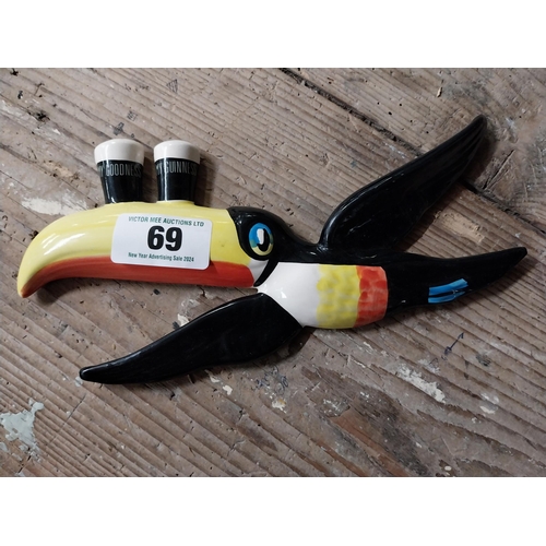 69 - Set of three ceramic Guinness Flying Toucans. {16 cm H x 27 cm W and 8 cm H x 17 cm W}.