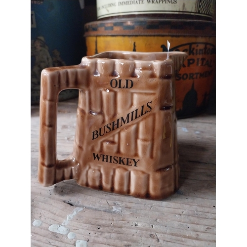 73 - Old Bushmills Whiskey ceramic advertising water jug Arklow pottery. {12 cm H x 16 cm W x 13 cm D}.