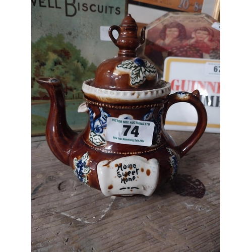 74 - 19th C. ceramic barge teapot. {19 cm H x 21 cm W x 13 cm D}.